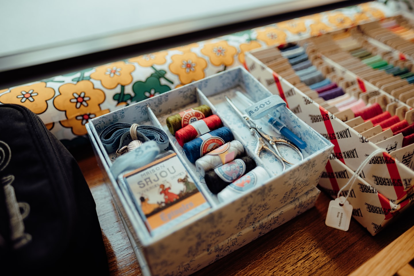A box of sewing tools.